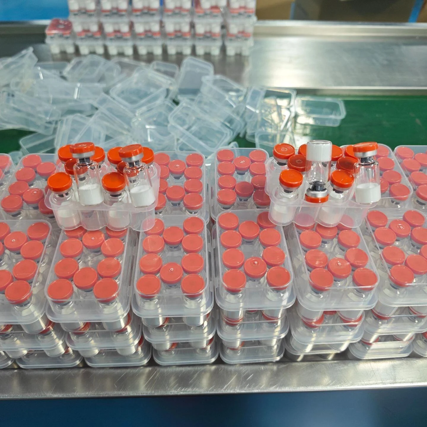 Client-provided photograph of unlabelled sample vials; product identity and public-use permission pending